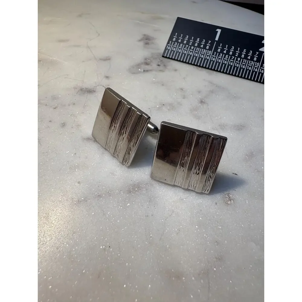 Vintage VTG Swank Cufflinks in a silver tone color